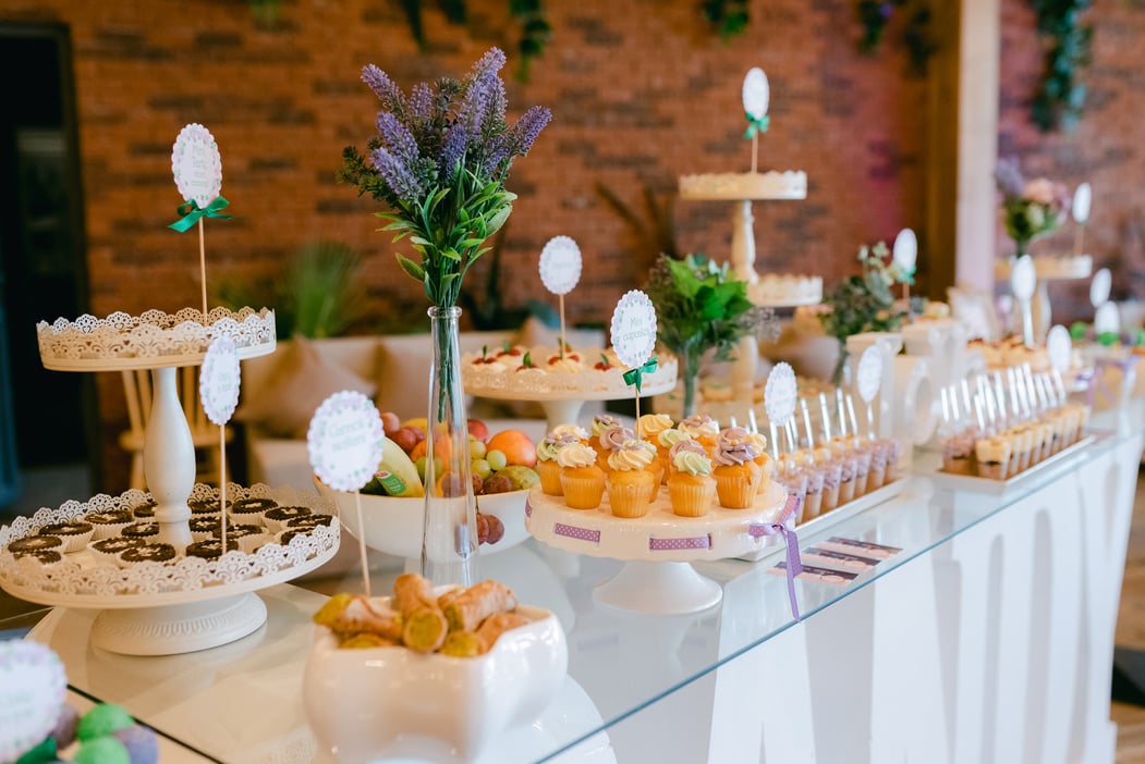 Different Delicious Desserts and Fruits on Table